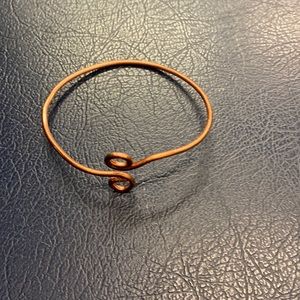 Handmade copper wire bracelet. Adjusts open to get it on and off